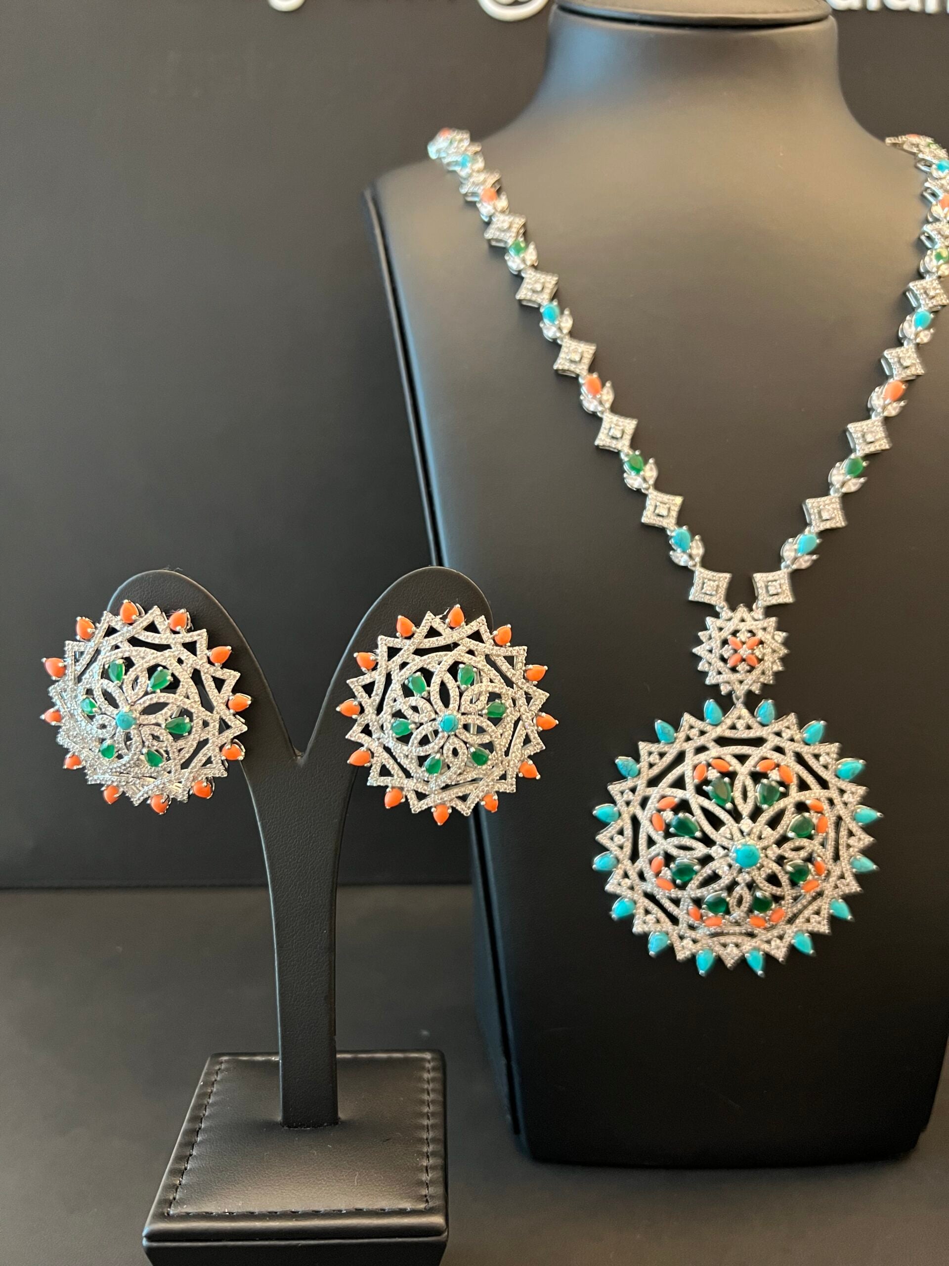 KALTHAM | ORANGE & GREEN